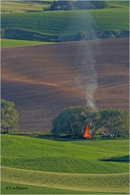 Burning slash plies in the Palouse wheat fields.