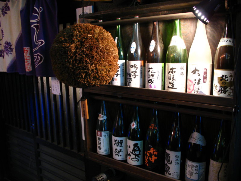 Sugidama and sake bottles outside Susukino bar