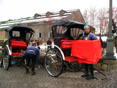 Parked rickshaws awaiting customers