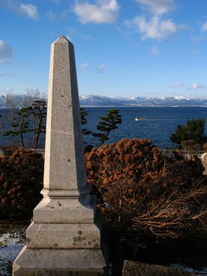 Obelisk gravemarker overlooking the bay