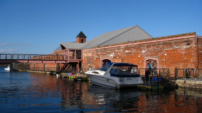 Red brick warehouses along the water