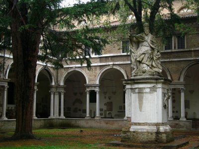 Papal statue in the cloister gardens