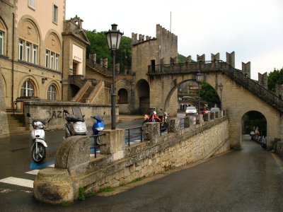 Mopeds parked outside the old town walls