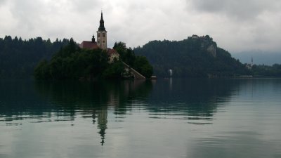 Island with distant Bled Castle beyond