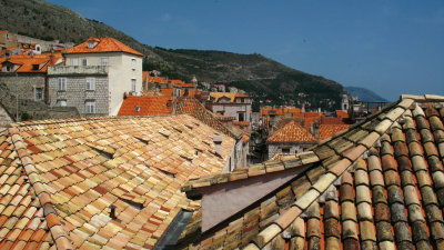 Stretch of unrestored roof tiles