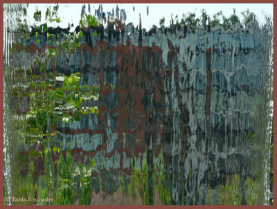 Buildings behind a curtain of water