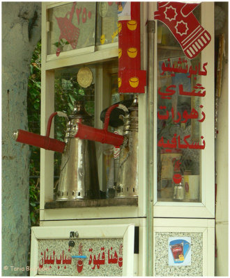 Coffee to go. Sign says ''coffee for lebanese youth''.