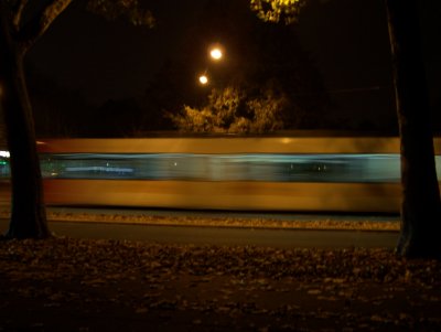 Ghostly tram cuts through city park