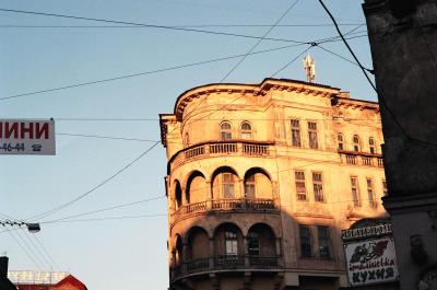 Grand old building being attacked by wires