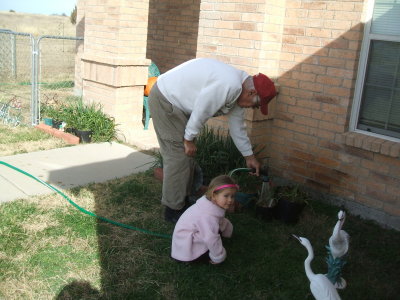 Katie helping to water the plants