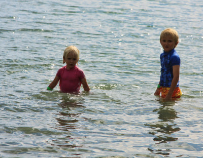 Charli and Zack swimming at Matiatia