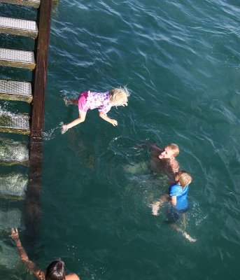 Charli, nearly 4, jumping off the wharf