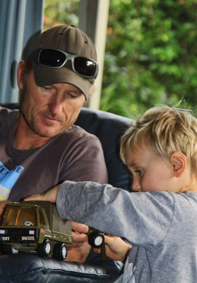 Daddy and Toby playing with the army truck