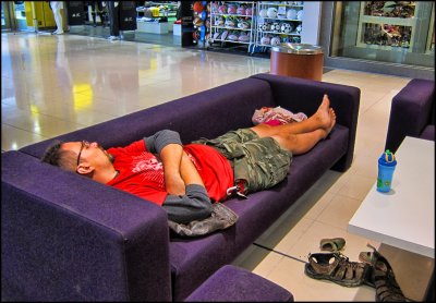Father and Child asleep at the Mall
