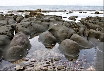 Rocky area between the bays
