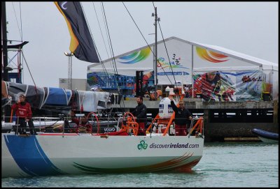 Sanya, with Cam on the stern, waving to us