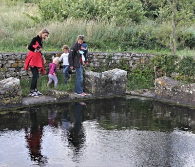 Christelle and Luna showing Sam and me the old water washing hole