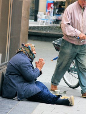 Poor lady begging for money