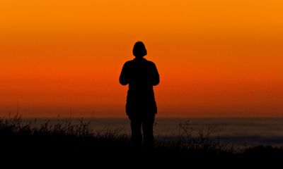 Woman silhouetted against red sky_4683Cr2Ps`0607092045.jpg