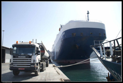 Ship unloading Sultan Qaboos Port