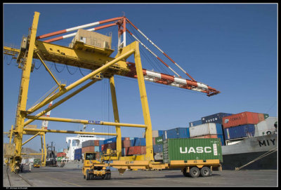 Ship unloading Sultan Qaboos Port