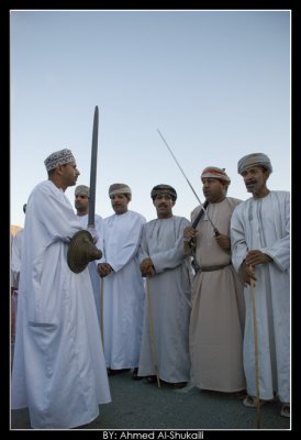 Omani men performing Razha (Folklore Dance)