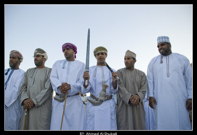 Omani men performing Razha (Folklore Dance)