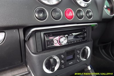 Audi TT blue new JVC radio running half amp system.jpg