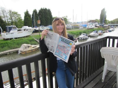 Reading about The Royal Wedding on our balcony in Sandwich