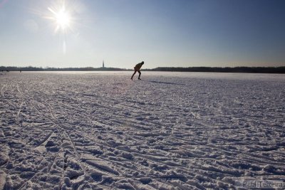 Ice skating on a Dutch frozen lake