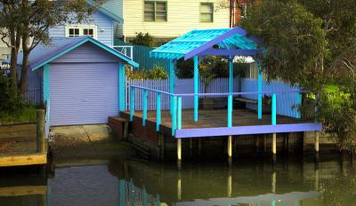 Blue and purple boat shed