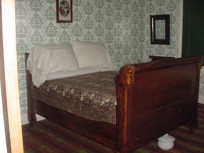 Notice the chamber pot under the bed...