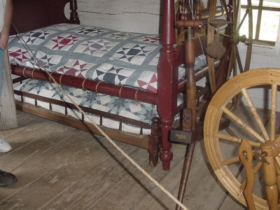 They had trundle beds back in the early 1800s.  See the bed under the main one?  It can be pulled out.