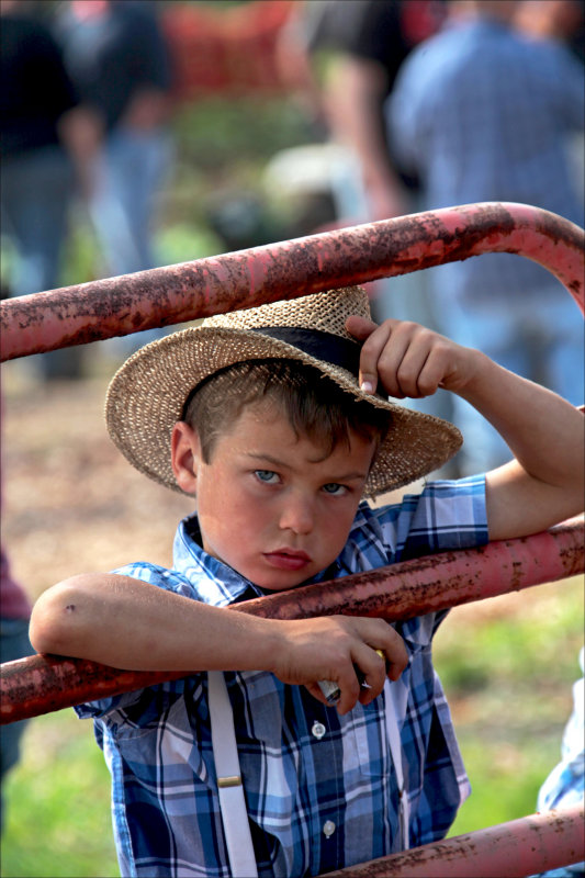 At the horse corral gate.