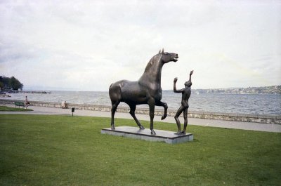 Boy with horse by the lake.jpg