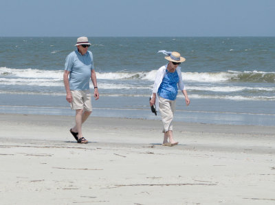 Mom and Dad looking for shells