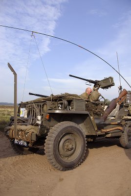 Jeep fitted with barbed wire cutter and .50 cal MG