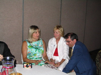 Linda Hahner Donovan and Darlene Rathke Angle chatting with George Lozos