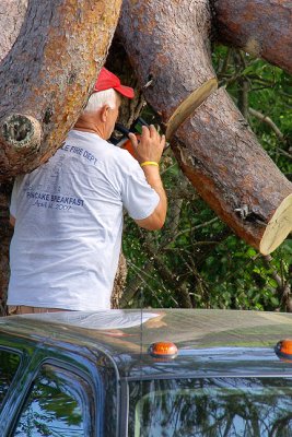 Peter Rice trimming the twisted pitch pine