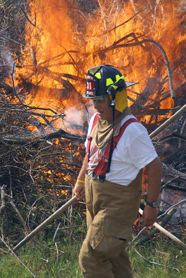 Peter Rice tending the burn