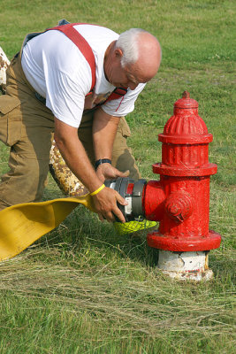 Peter Rice preparing the hose and hydrant
