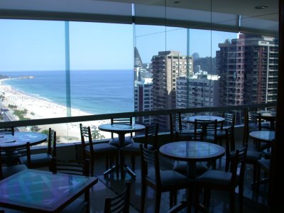 A mirror reflects some Ipanema buildings