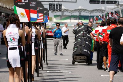 The grid girls parade