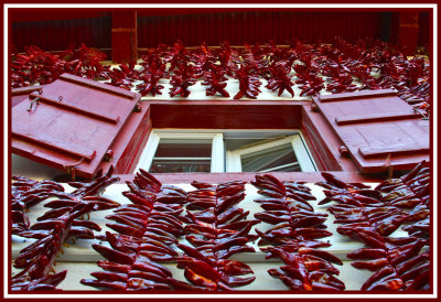 LAYERED - Hanging peppers in Espelette, France