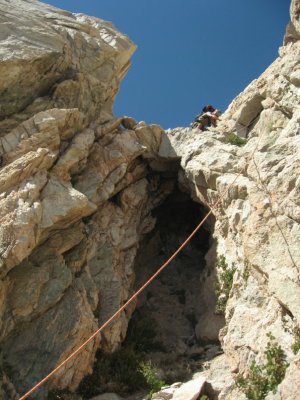 Climbing down past big cave