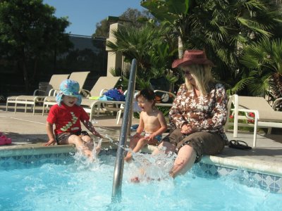 Auntie Yvonne splashing around with Dylan and Corrina