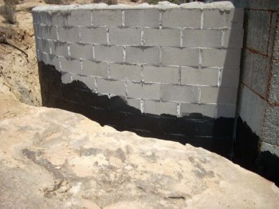 Waterproofing between Rastra and slickrock