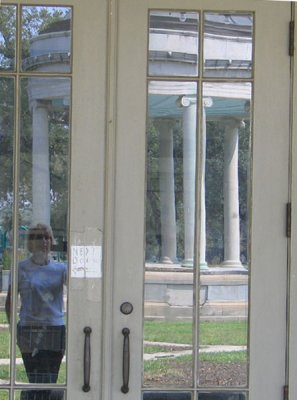 Reflections in an antique glass door
