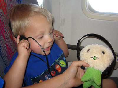 Simon and Baby rock out on the plane to FL