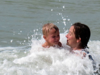 Simon and Mommy ride the waves